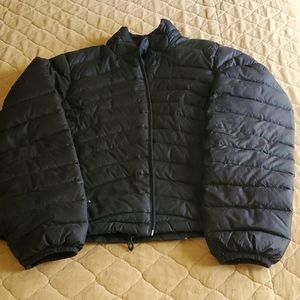 Black puffer jacket.